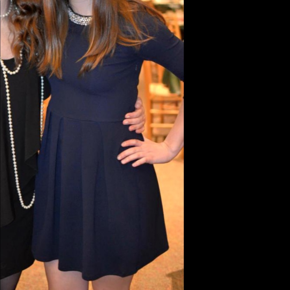 Francesca’s navy 3/4 sleeve dress with beaded neck